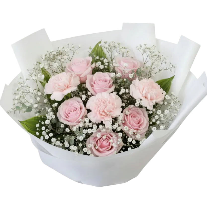 Bouquet of bright pink roses with green leaves on a light background